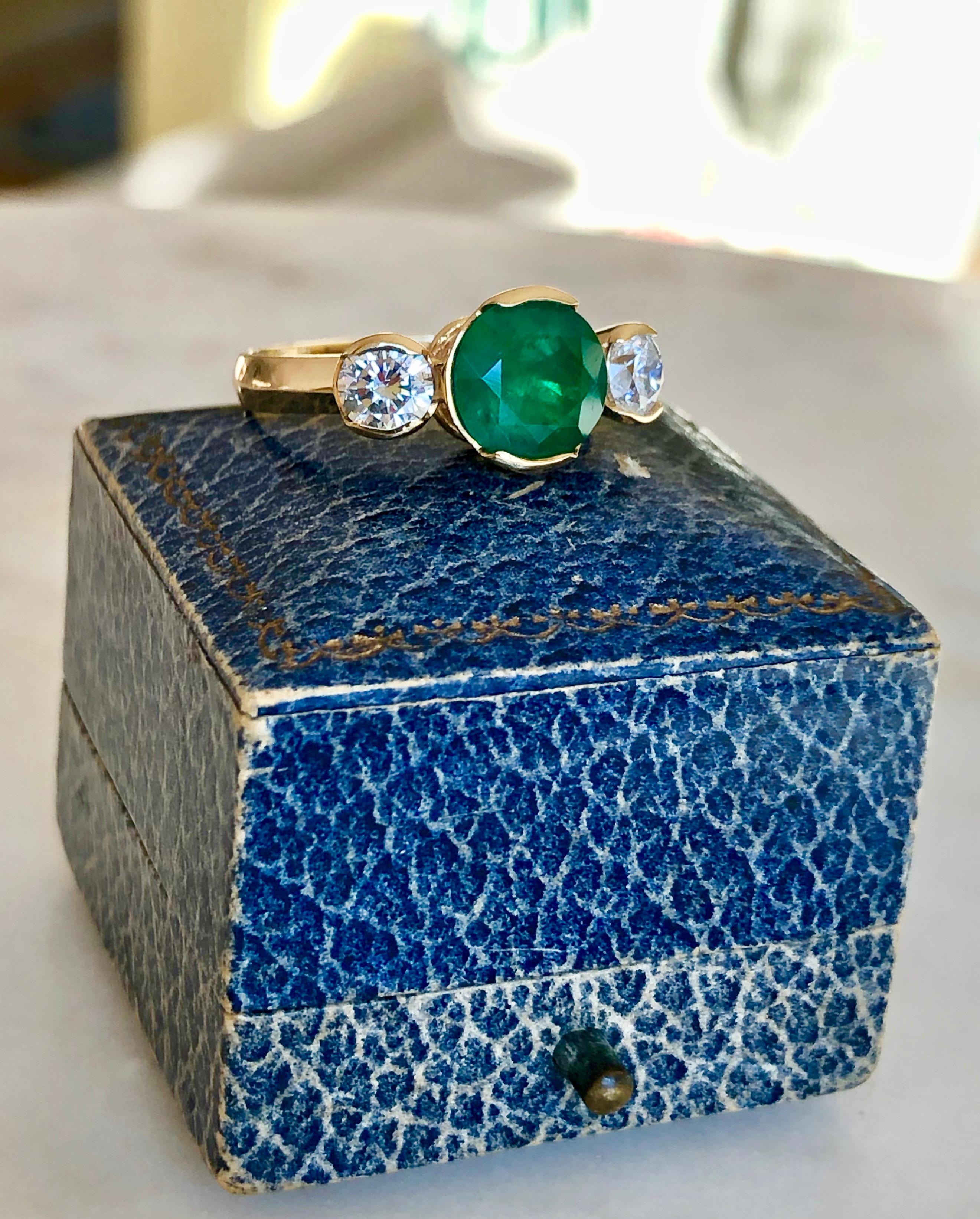 Contemporary Round Colombian Emerald Diamond Engagement Three-Stone Ring 18 Karat