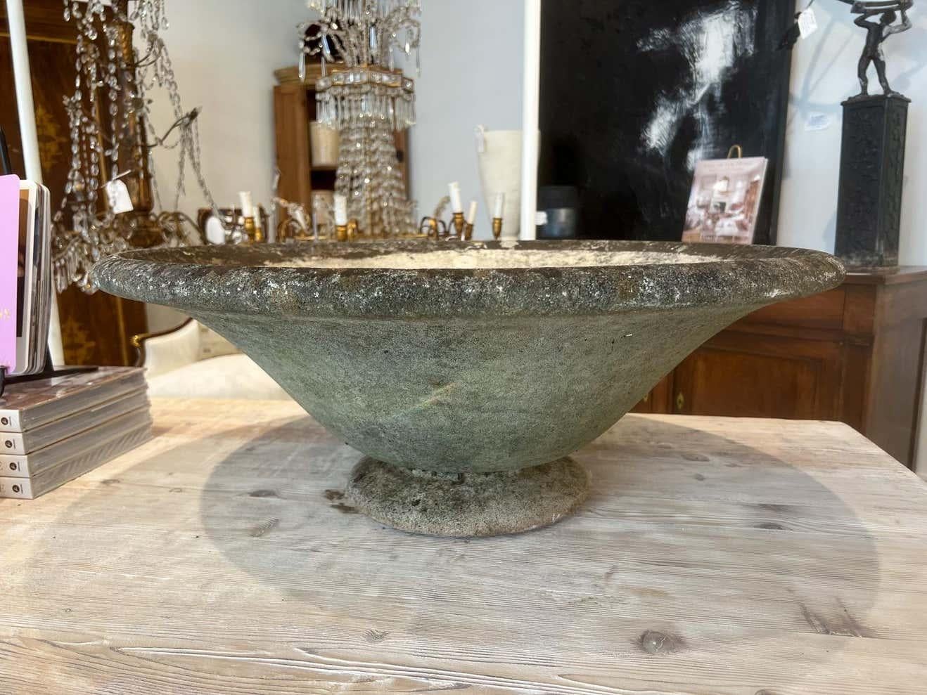 Large indoor or outdoor planter with midcentury aesthetic.