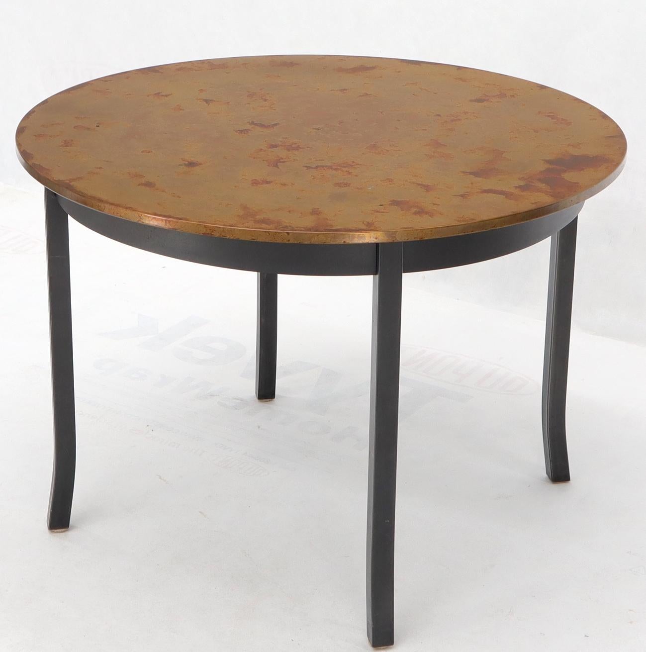 Studio made Mid-Century Modern era black metal frame copper top round dining table.