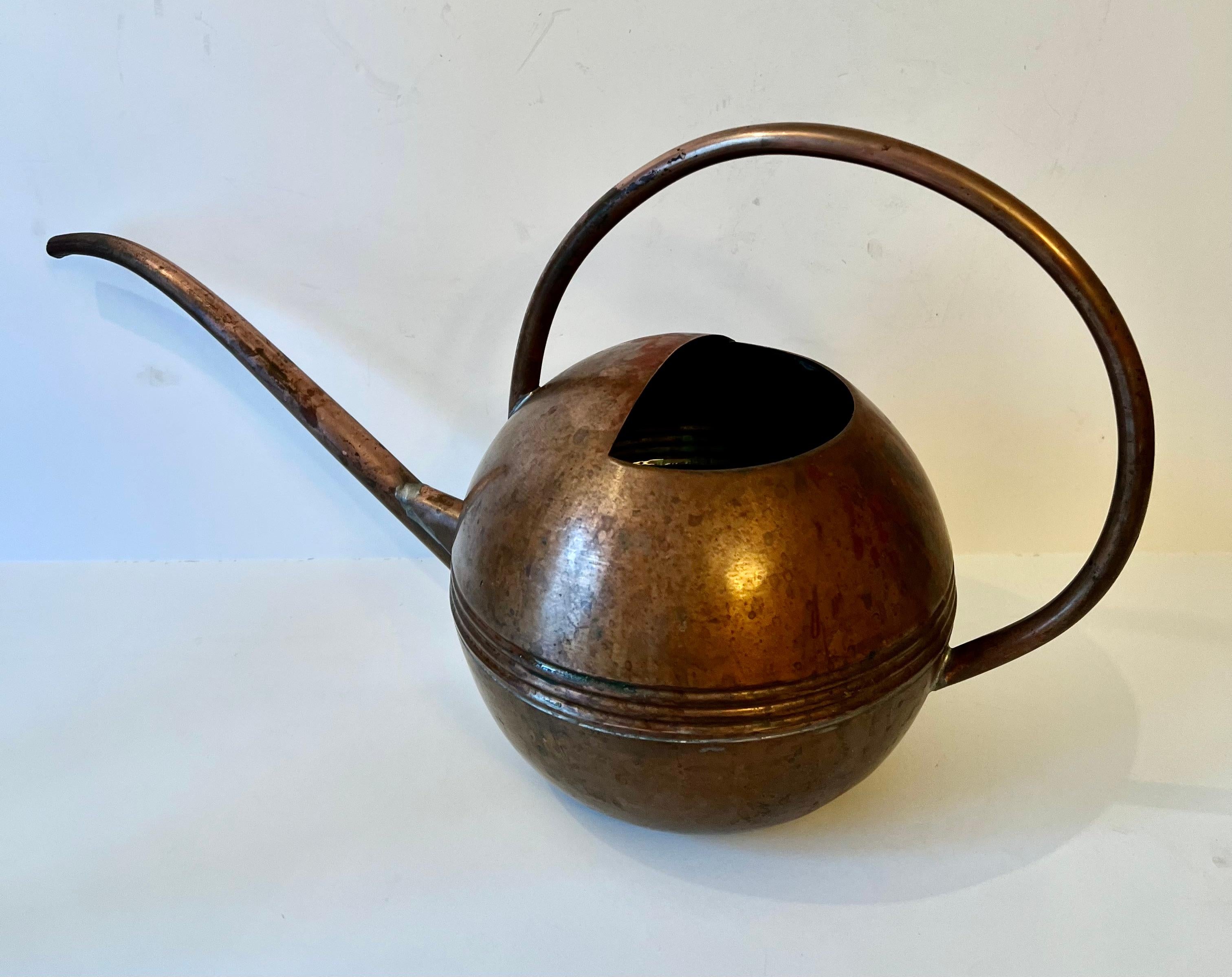 A lovely vintage watering can, fully functional and ideal for the inside plants, a greenhouse area or your smaller garden plants... pretty enough to be a decorative piece.. the patina is quite heavy and certainly beautiful. a show stopper. a nice