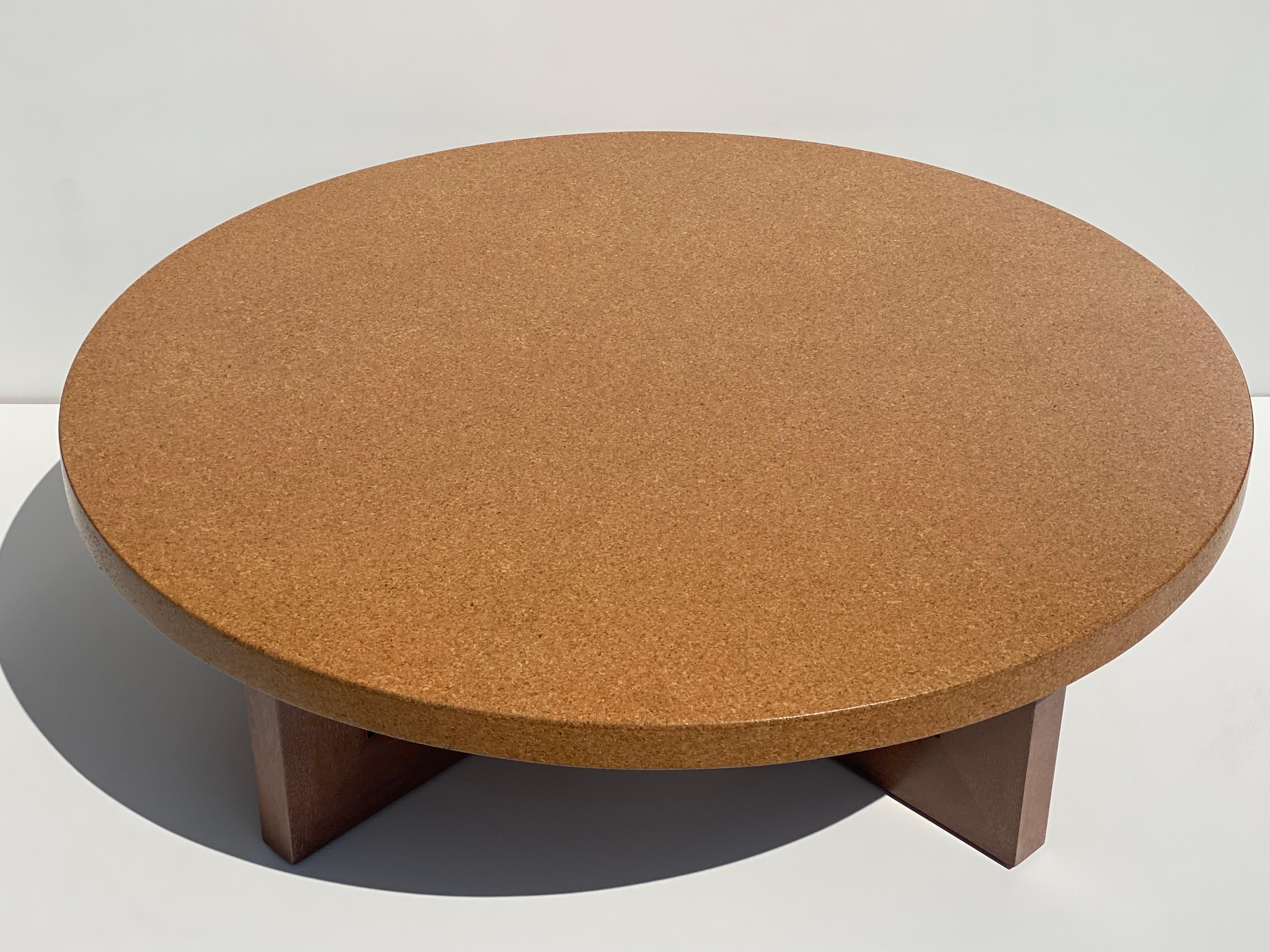 Round cork coffee table with solid mahogany legs newly made in the style of Paul Frankl
