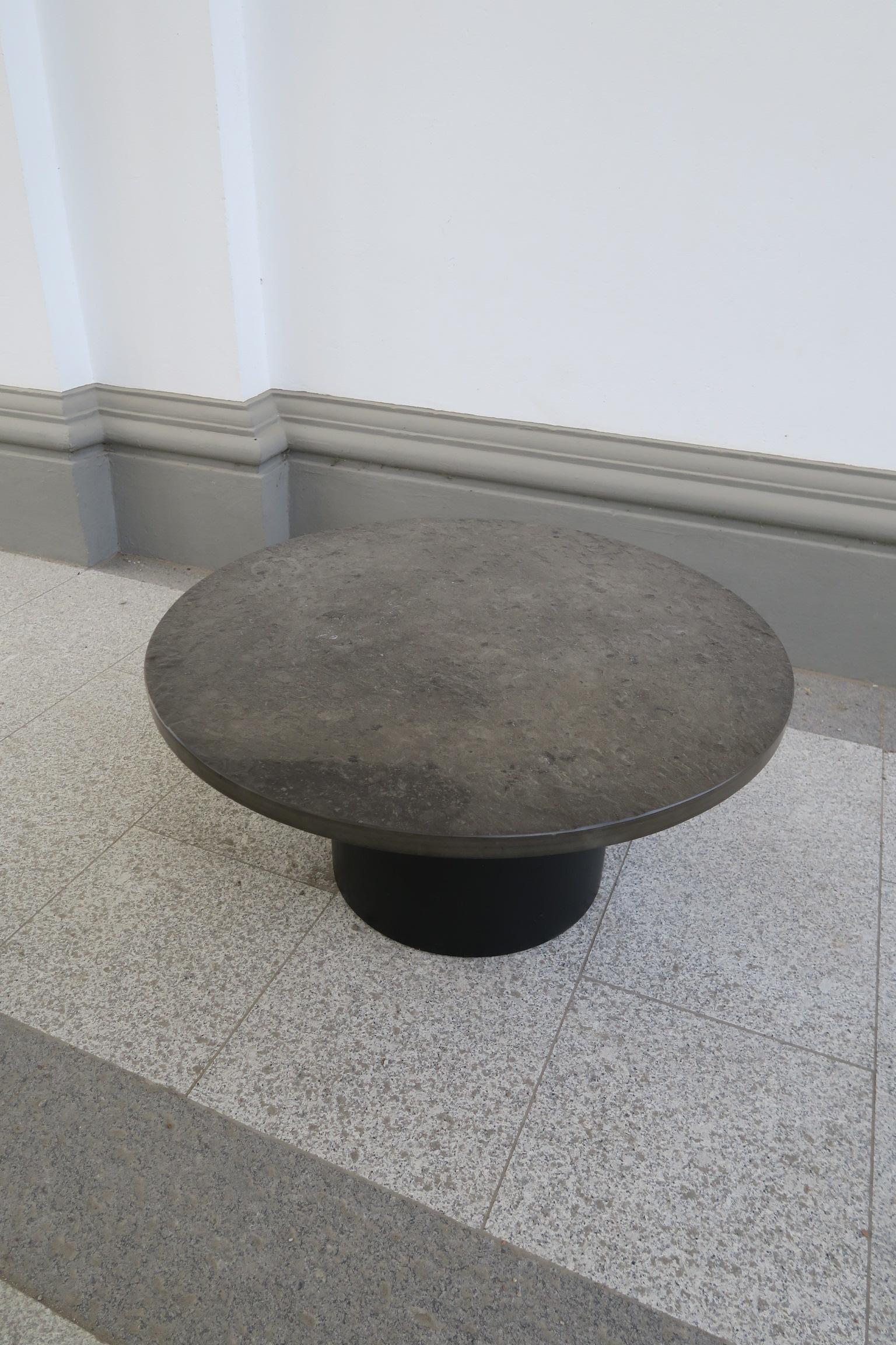 Brutalist round couch table with black slade plate by draenert studios For Sale