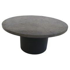 round couch table with black slade plate by draenert studios