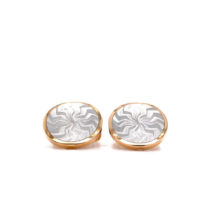 Victor Mayer round cufflinks, Globetrotter Collection, 18k rose gold and white gold inlays, authentic >flame pattern< guilloché engraving

About the creator Victor Mayer
Victor Mayer is internationally renowned for elegant timeless designs and