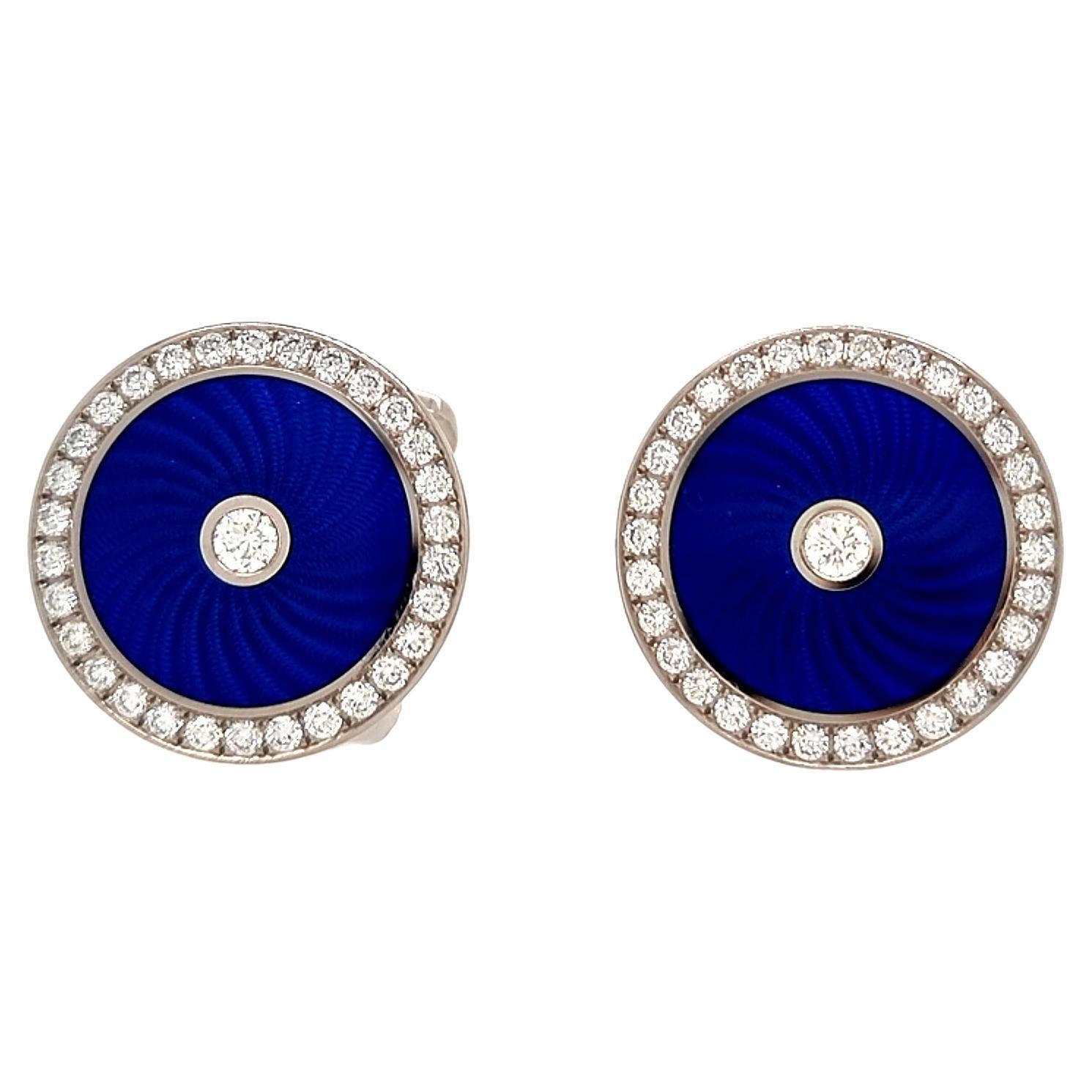 Victor Mayer Round Cufflinks, Globetrotter Collection, 18k White Gold, Electric Blue Vitreous Enamel, Guilloche, 62 Diamonds, total 1.40 ct, G VS

About the creator Victor Mayer
Victor Mayer is internationally renowned for elegant timeless designs