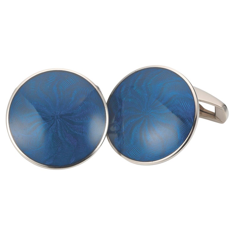 Victor Mayer round cufflinks, 18k white gold, petrol blue vitreous enamel, windmill guilloche pattern, diameter app. 20.0 mm

About the creator Victor Mayer
Victor Mayer is internationally renowned for elegant timeless designs and unrivalled