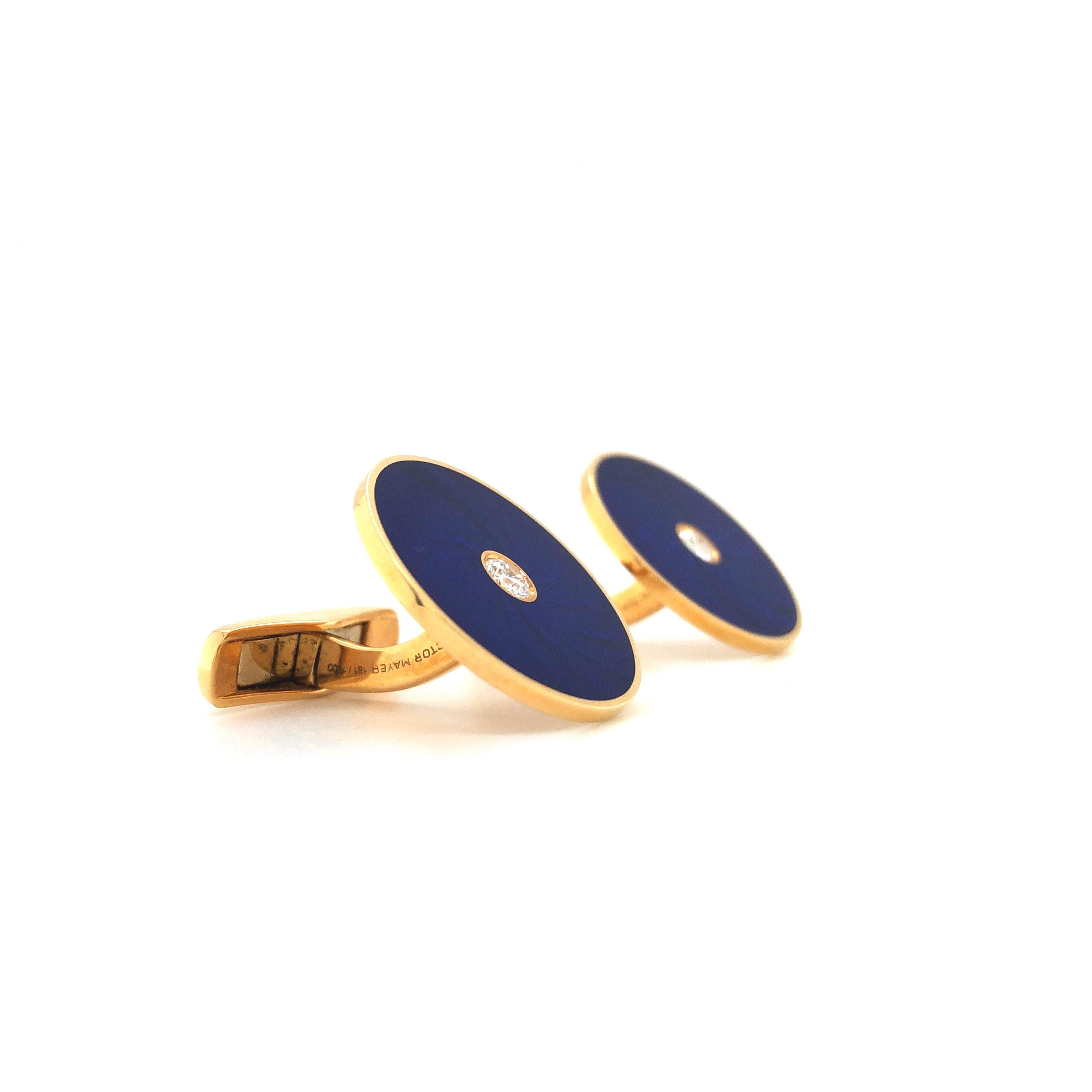Victor Mayer round cufflinks, Globetrotter Collection, 18k yellow gold, navy blue vitreous enamel, windmill guilloche, 2 diamonds, total 0.26 ct, G VS, diameter 20.0 mm

About the creator Victor Mayer
Victor Mayer is internationally renowned for