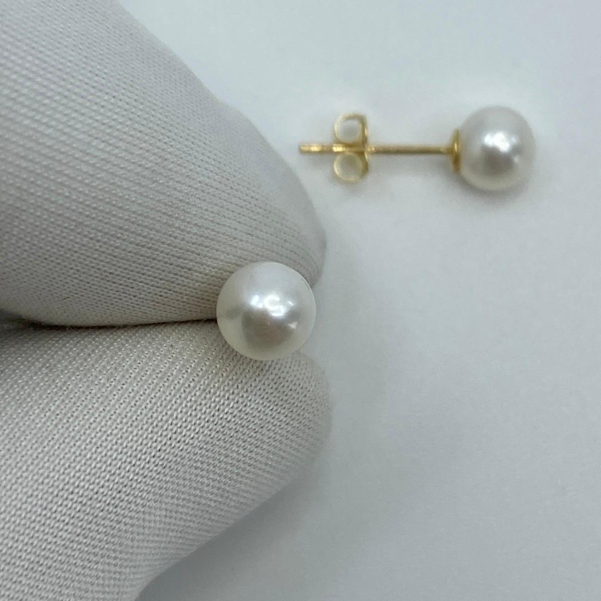 Cultured Freshwater White Pearl Yellow Gold Earring Studs.

Beautiful 5mm matching pair of round pearls with excellent lustre, shape and colour. 

Set in lightweight 9k yellow gold suds with butterfly backs.

Perfect matching pair.

Brand new and