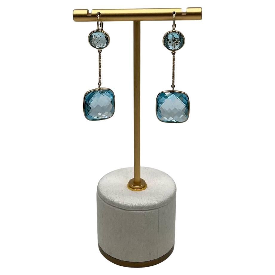 Pendientes de oro de 14 quilates en forma de cojín redondo con diamantes y topacio azul en venta