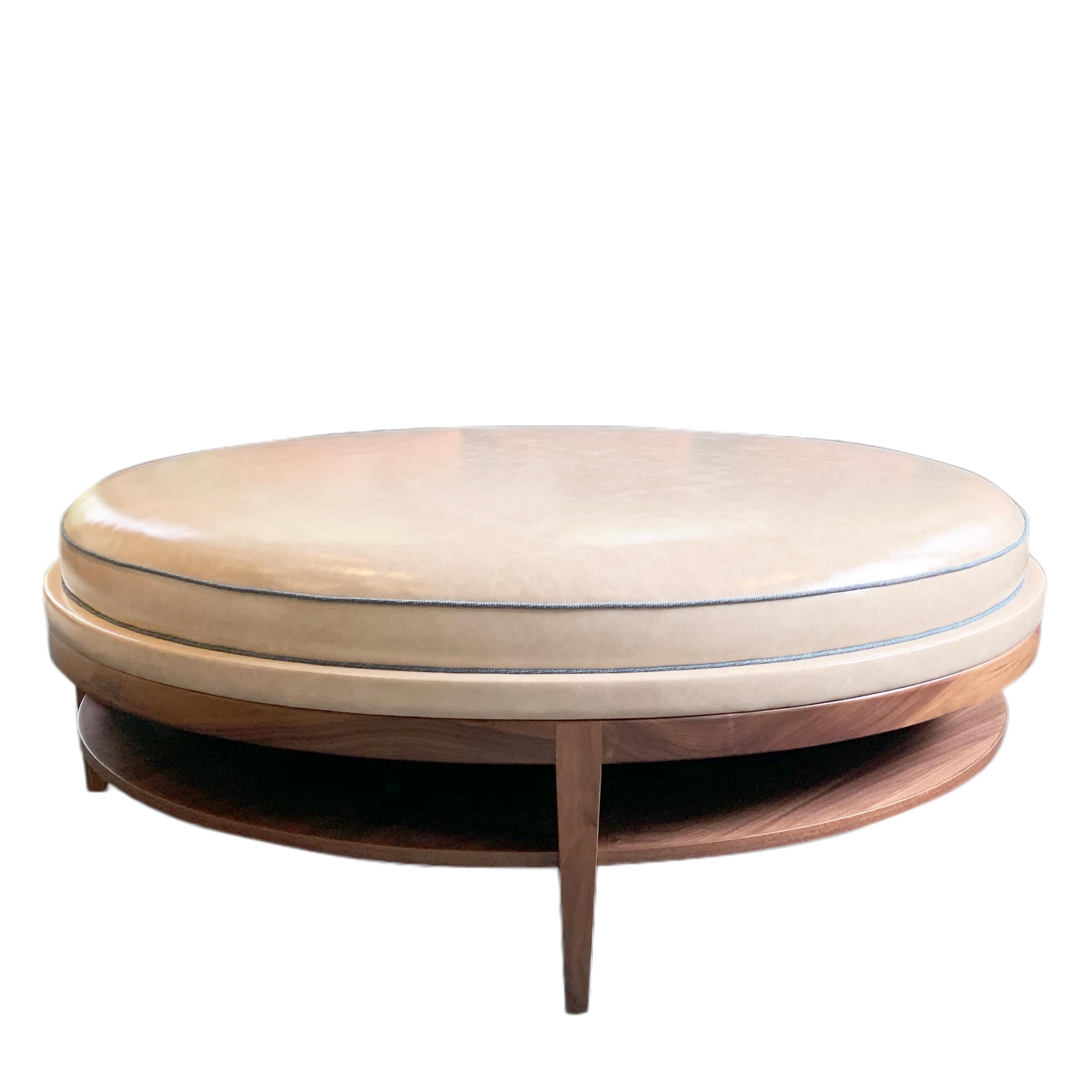 round upholstered coffee table with storage