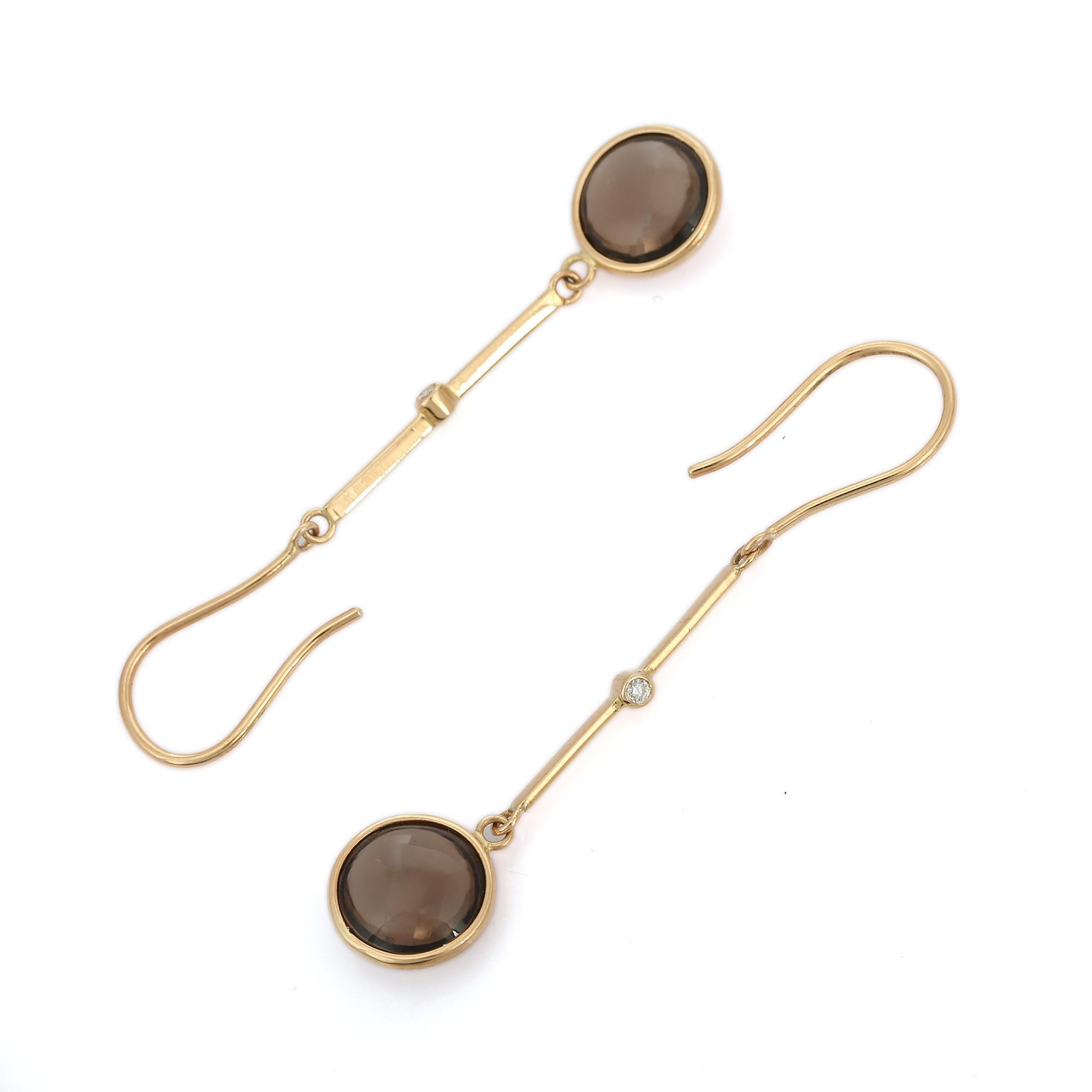 18K Yellow Gold Smoky Topaz Drop earrings to make a statement with your look. These earrings create a sparkling, luxurious look featuring round cut gemstone.
If you love to gravitate towards unique styles, this piece of jewelry is perfect for