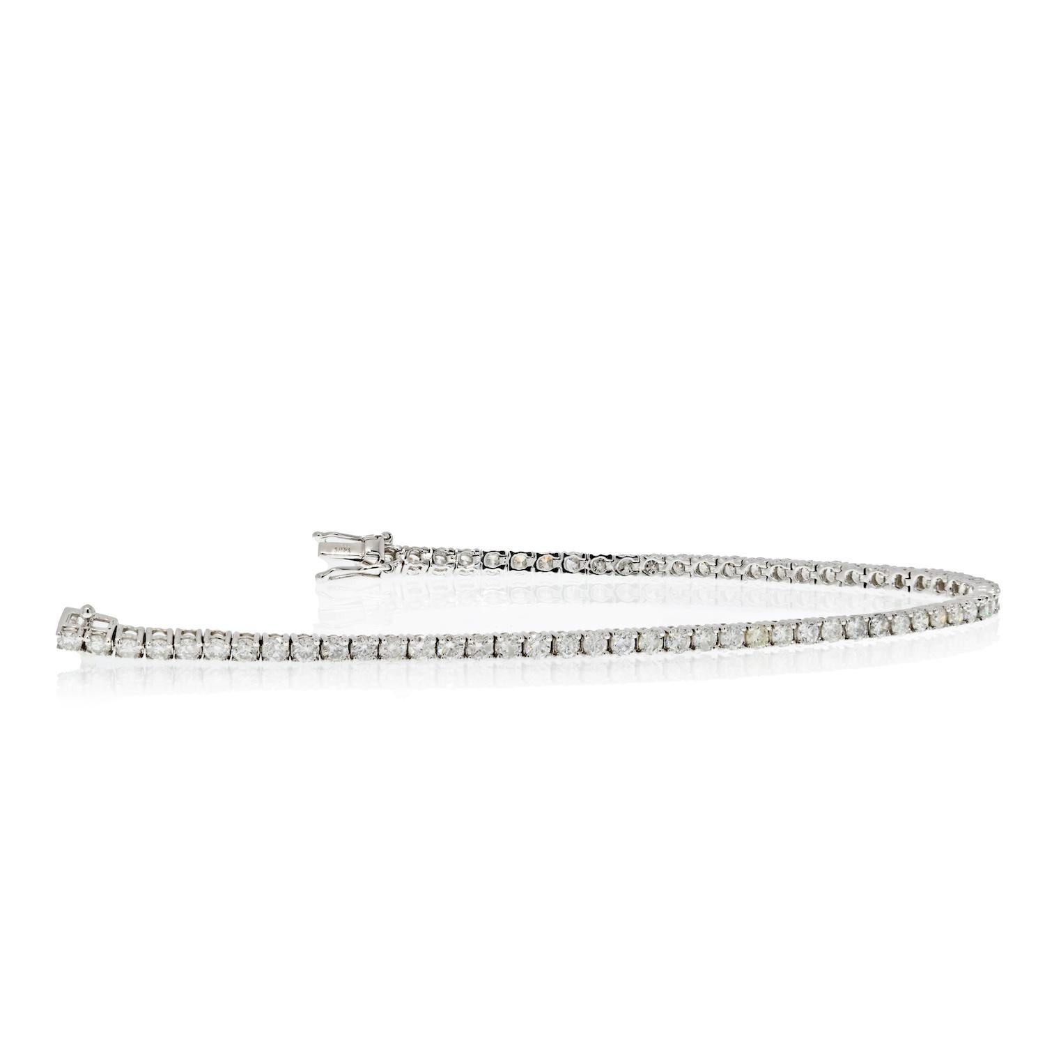 Delicate, beautiful, and elegant natural Diamond box chain tennis bracelet. All of the stones are mounted on four prongs and are ideal brilliant-cut for optimal sparkle and shine. Bracelets have metal purity and diamond carat stamped/engraved on the