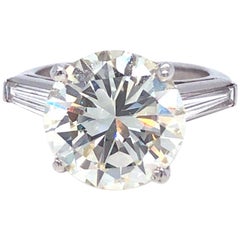 Round Cut 5.45ct Diamond Platinum Ring with 1.25ct Two Baguettes Tw H, G Color Round Cut 5.45ct Diamond Platinum Ring with 1.25ct Two Baguettes Tw H, G Color