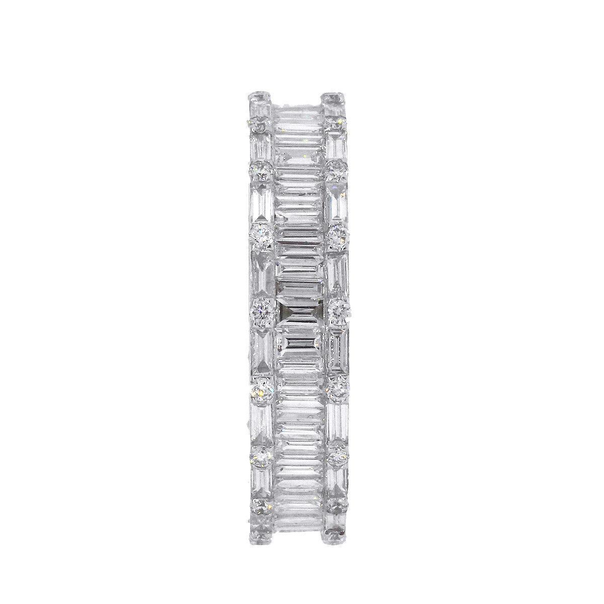 Material: 18k white gold
Round Diamond Details: Approximately 0.29ctw of Round cut diamonds. Diamonds are F/G in color and VS in clarity.
Baguette Diamond Details: Approximately 1.82ctw of Baguette cut diamonds. Diamonds are F/G in color and VS in