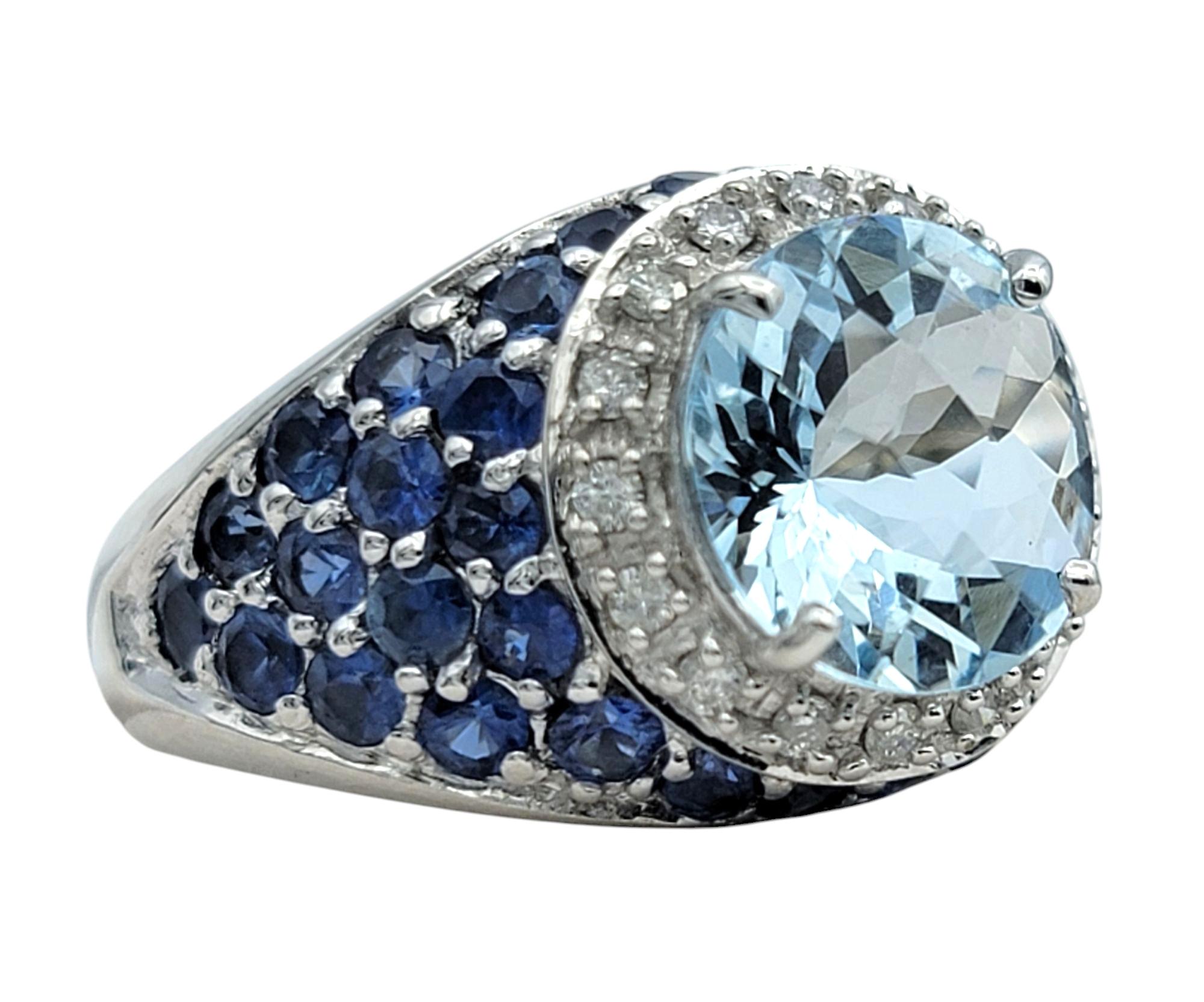 Contemporary Round Cut Aquamarine Ring with Pavé Sapphires and Diamonds 14 Karat White Gold For Sale