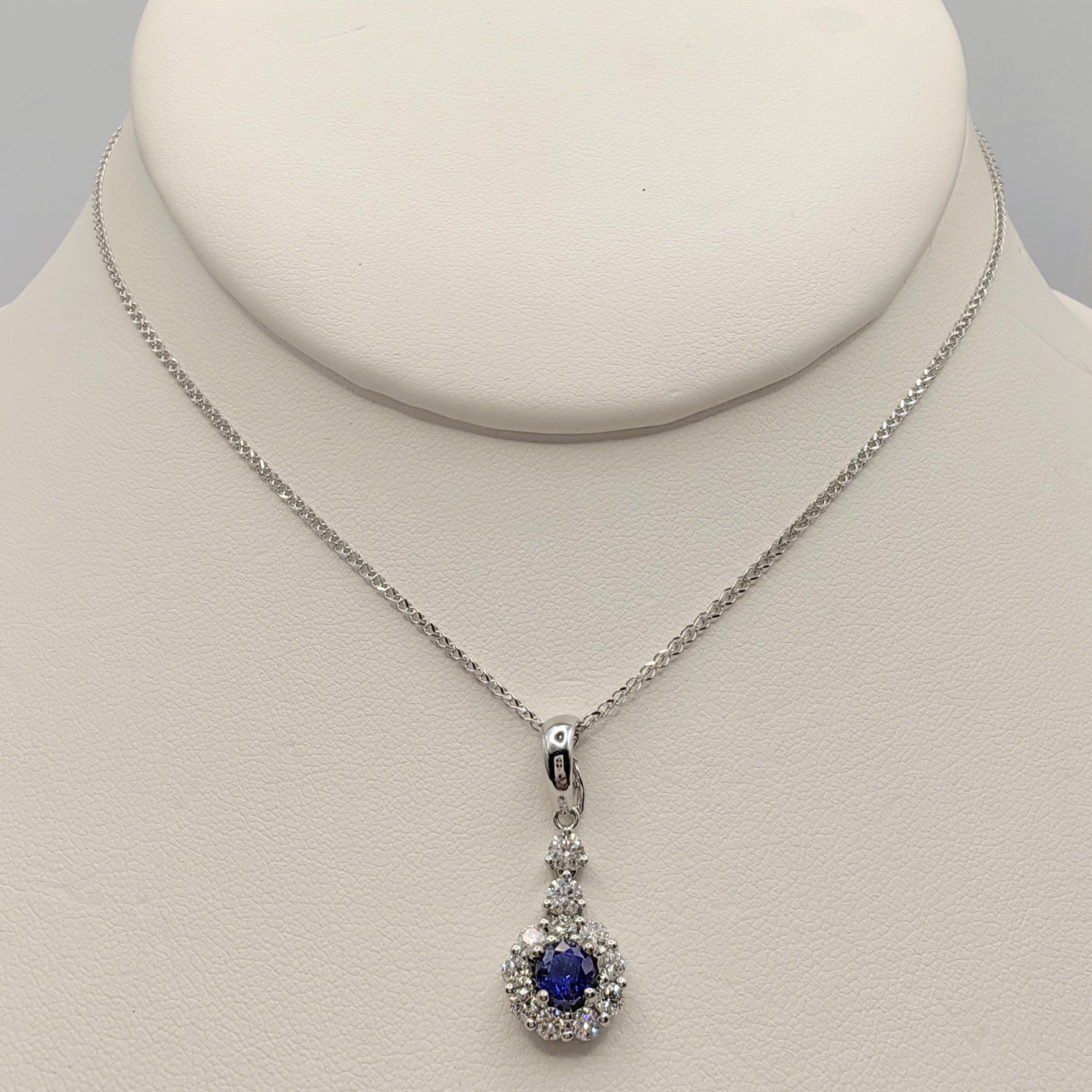Indulge in the captivating allure of our Round-cut Blue Sapphire Diamond Halo Necklace Pendant in 18K White Gold. This pendant showcases the remarkable beauty of the blue sapphire, a gemstone renowned for its mesmerizing charm and symbolic