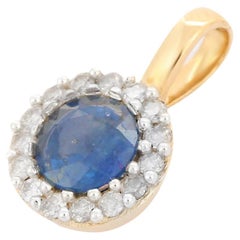 Round Cut Blue Sapphire Pendant with Halo of Diamonds in 14K Yellow Gold 