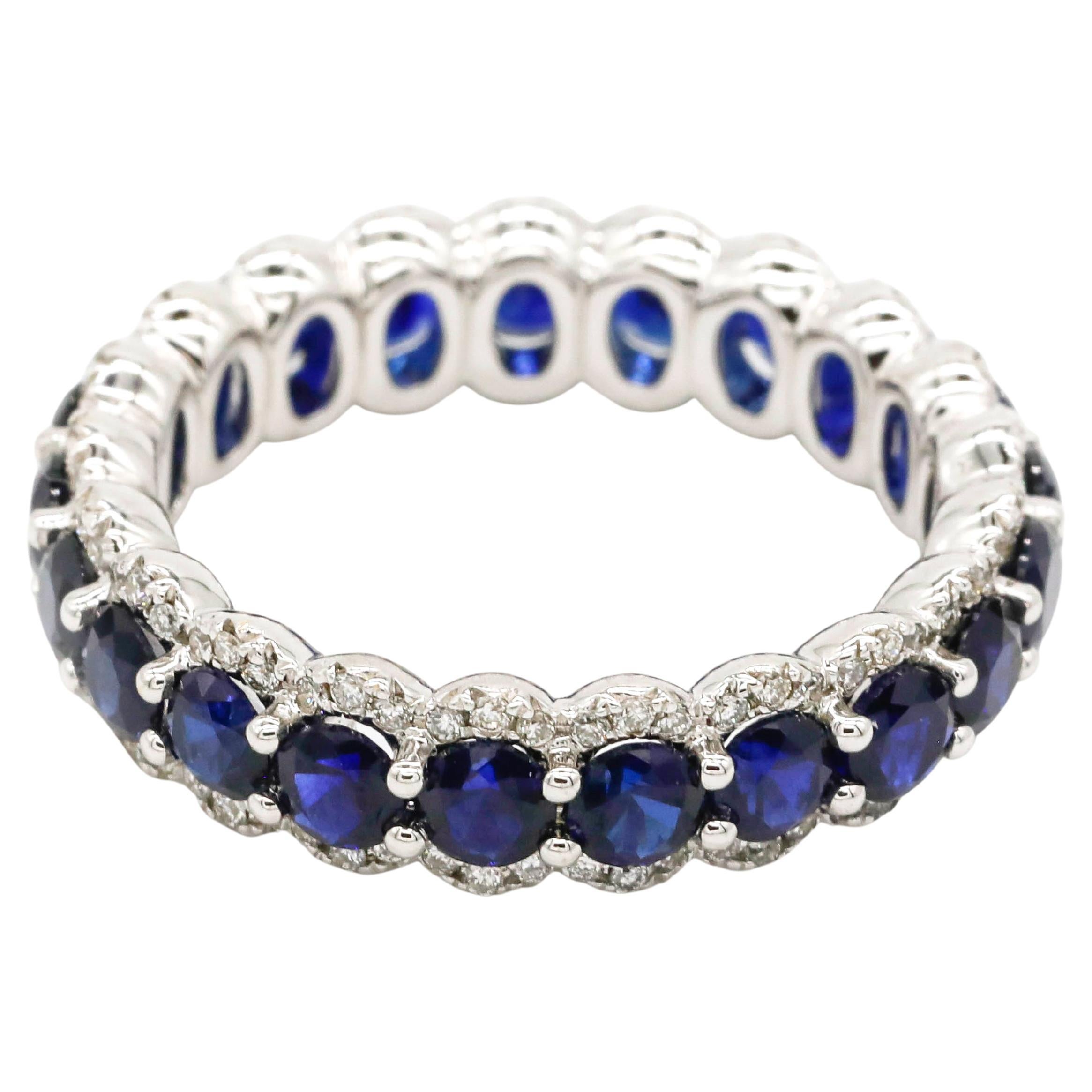 Round Cut Blue Sapphire Prong Set Diamond Eternity Band Ring in 18 K Gold White