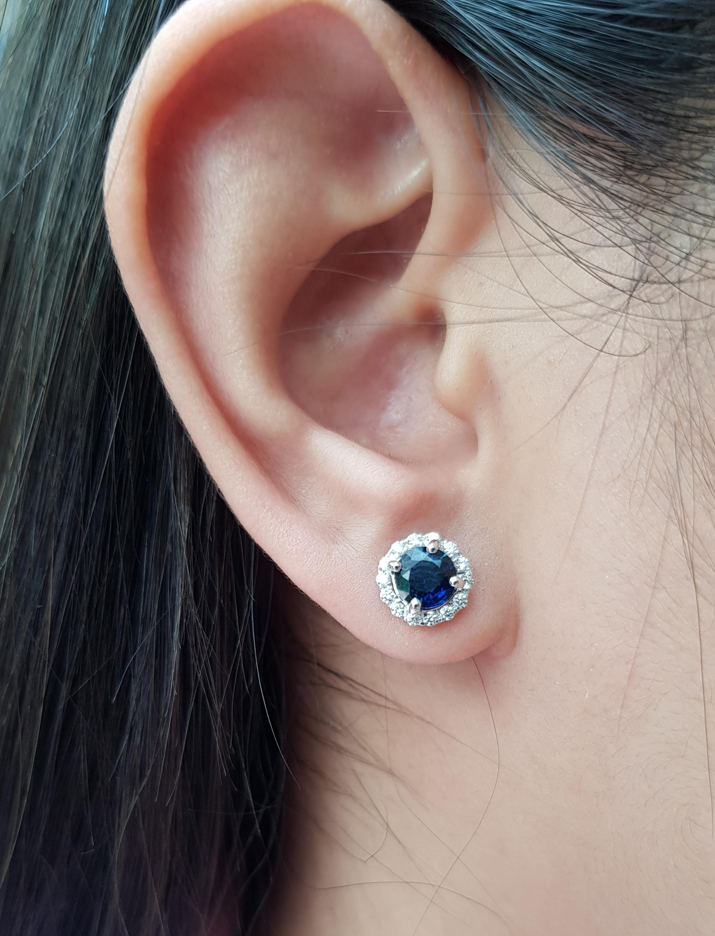 Blue Sapphire 1.60 carats with Diamond 0.26 carat Earrings set in 18 Karat White Gold Settings

Width: 0.8 cm
Length: 0.8cm 

