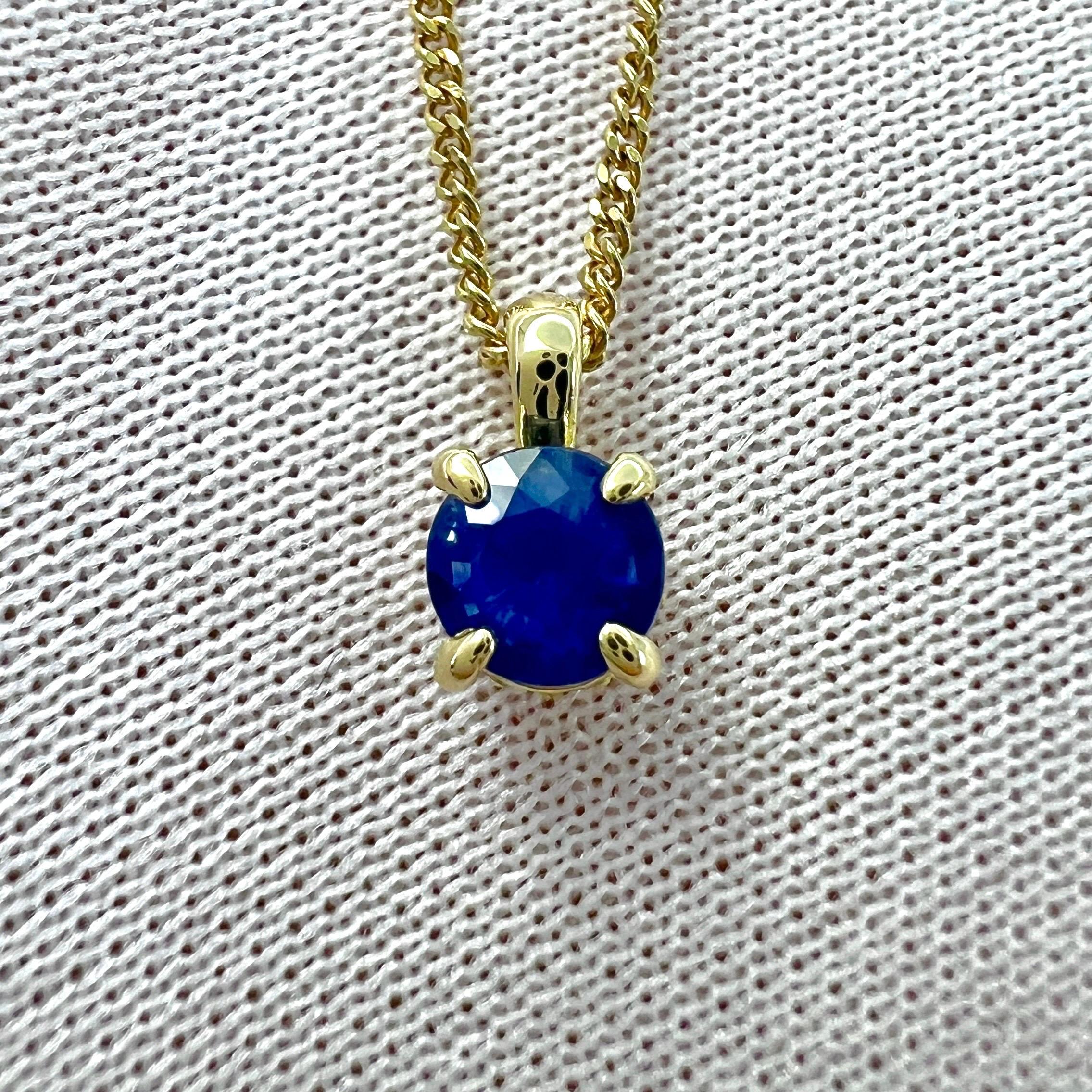 Fine Cornflower Round Cut Ceylon Blue Sapphire & Diamond 18k Yellow Gold Pendant.

0.50 Carat sapphire with a fine vivid cornflower blue colour and very good clarity. A very clean stone with only some very small natural inclusions visible when