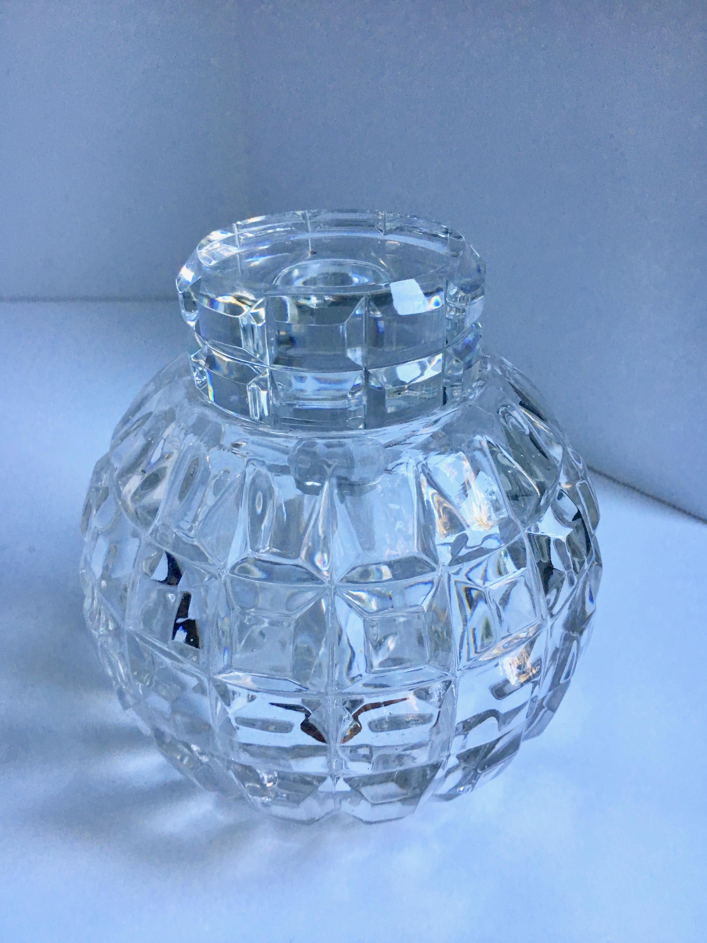 Round Cut Crystal Decanter - a handsome and unique decanter ready for the stylish bar or to store you favorite candy in!?