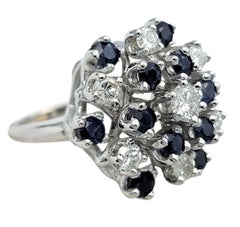 Round Cut Diamond and Blue Sapphire Cluster Cocktail Ring in 14 Karat White Gold