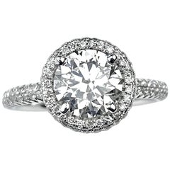 Round Cut Diamond Engagement Ring with Pavé Halo and Shank in White Gold