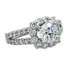 Round Cut Diamond Halo and Split Shank Engagement Ring in 14 Karat White Gold