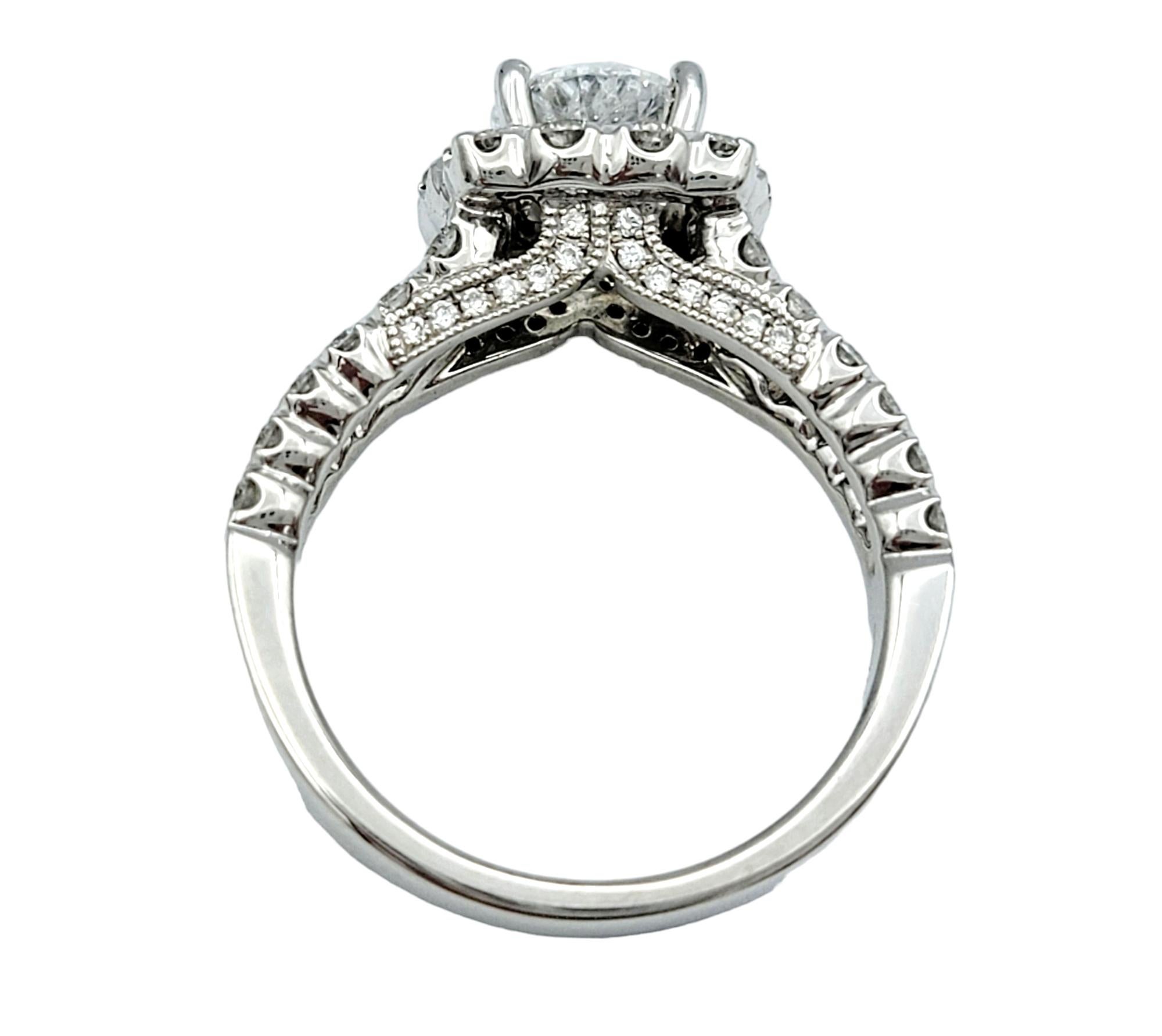 Women's Round Cut Diamond Halo and Split Shank Engagement Ring in 14 Karat White Gold For Sale
