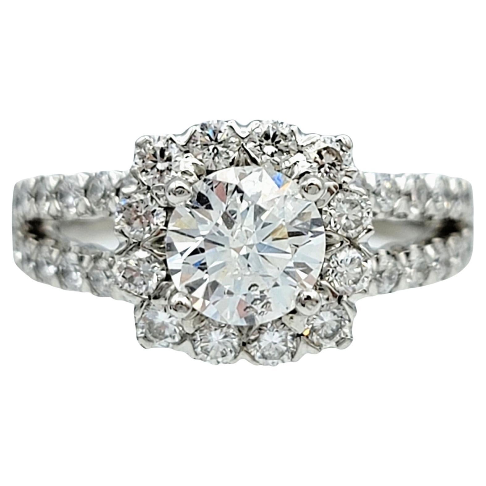 Round Cut Diamond Halo and Split Shank Engagement Ring in 14 Karat White Gold