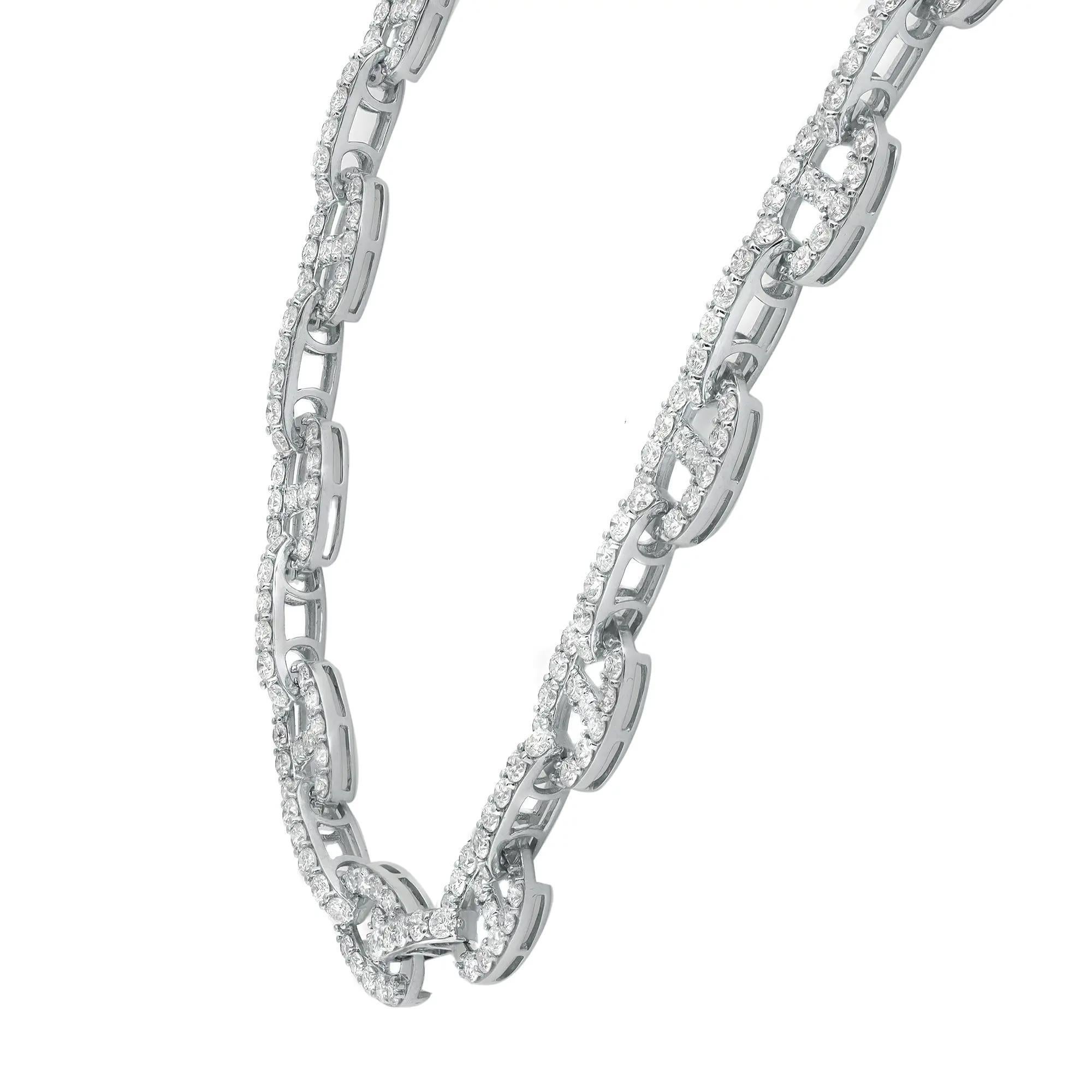 This gorgeous statement necklace features prong set round brilliant cut diamond studded links crafted in 18K white gold. Total diamond weight: 14.96 carats. Diamond quality: color G-H and clarity VS-SI. Necklace length: 17.5 inches. Oval link size:
