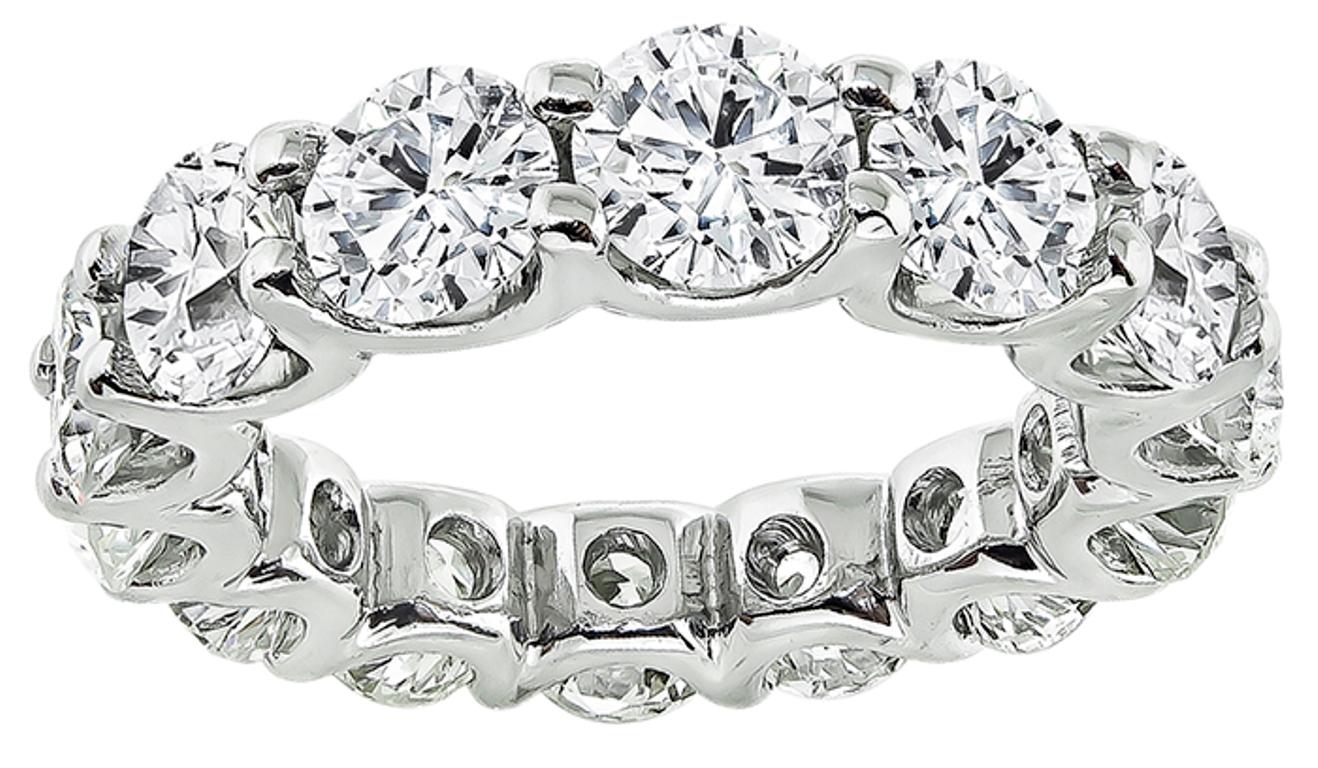 This elegant platinum eternity wedding band is set with sparkling round cut diamonds that weigh approximately 5.65ct. graded G-H color with VS1 clarity. The band measures 5mm in width and weighs 8.6 grams. 
The band is size 5 1/2.


Inventory