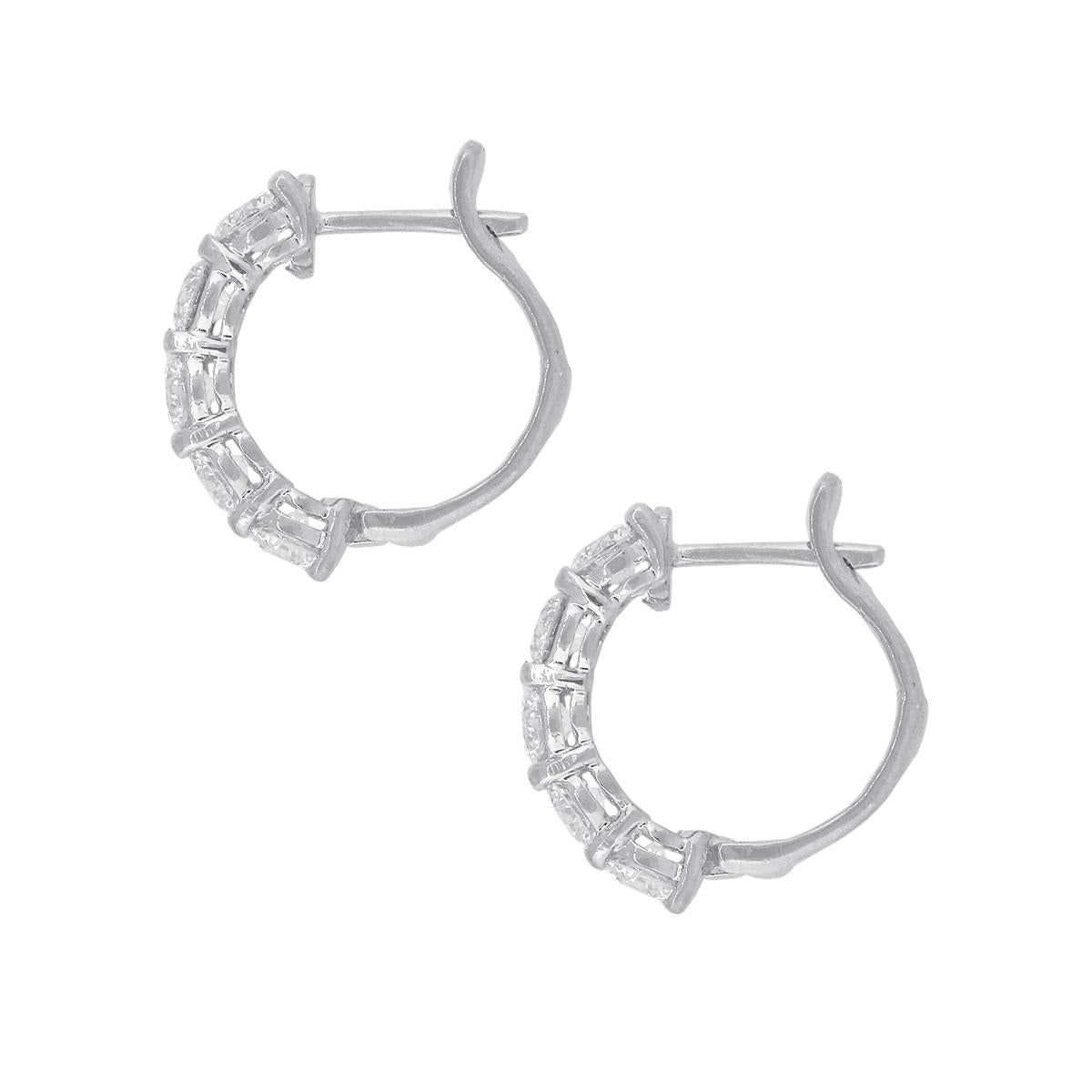 Material: 14k white gold
Diamond Details: Approx. 1.78ctw of round cut diamonds. Diamonds are G/H in color and VS in clarity
Earring Measurements: 0.62