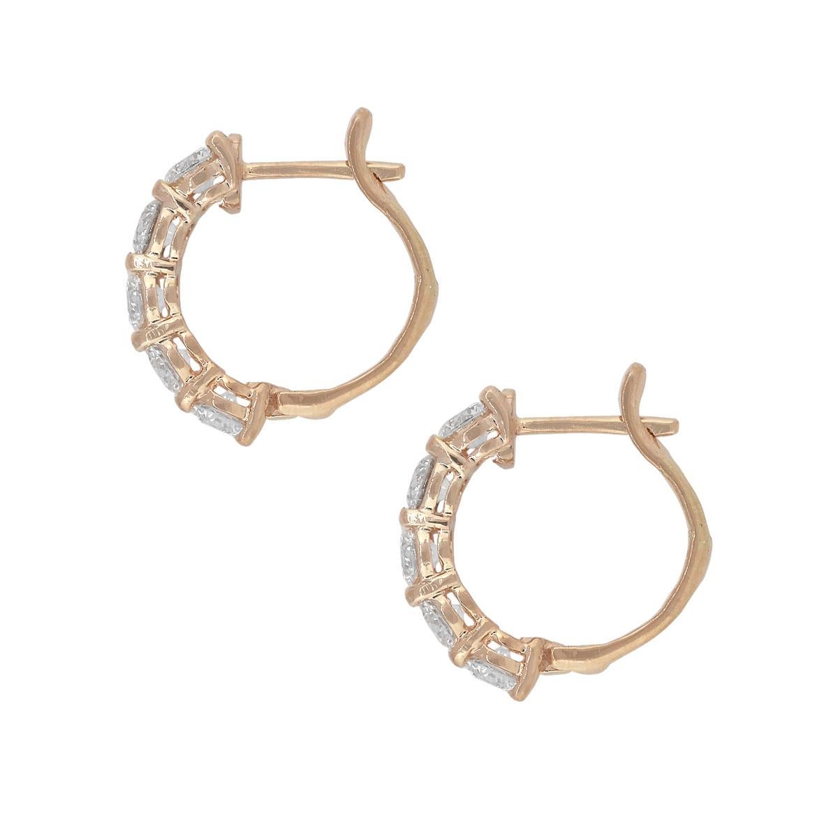 Material: 14k rose gold
Diamond Details: Approx. 1.78ctw of round cut diamonds. Diamonds are G/H in color and VS in clarity
Earring Measurements: 0.62