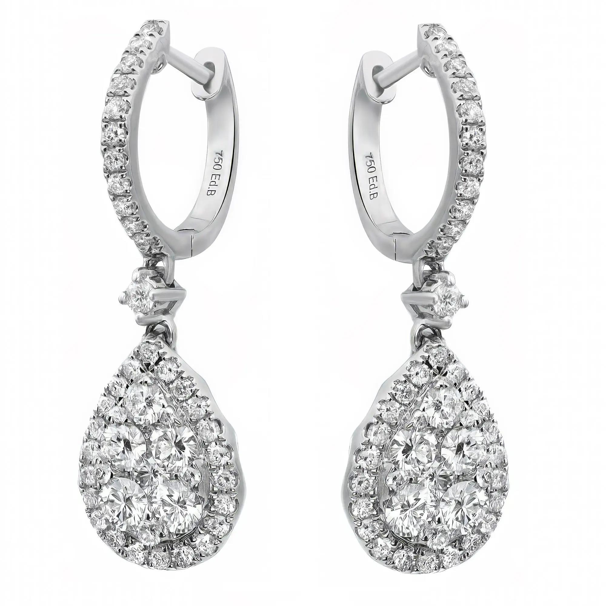 Chic and exquisite, diamond drop earrings crafted in lustrous 18K white gold. It features sparkling round brilliant cut diamonds set in a teardrop shape mounting in prong and invisible setting giving an illusion of a bigger size diamond that dangles