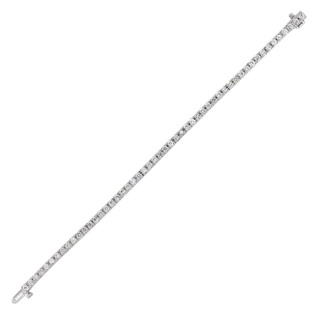 Material: 14k White Gold
Diamond Details: Approximately 2.66ctw of round cut diamonds. Diamonds are G/H in color and SI in clarity
Clasp: Tongue in box with safety latch
Measurements: Will fit up to a 7″ wrist
Total Weight: 15.8g (9.8dwt)
SKU: G8413