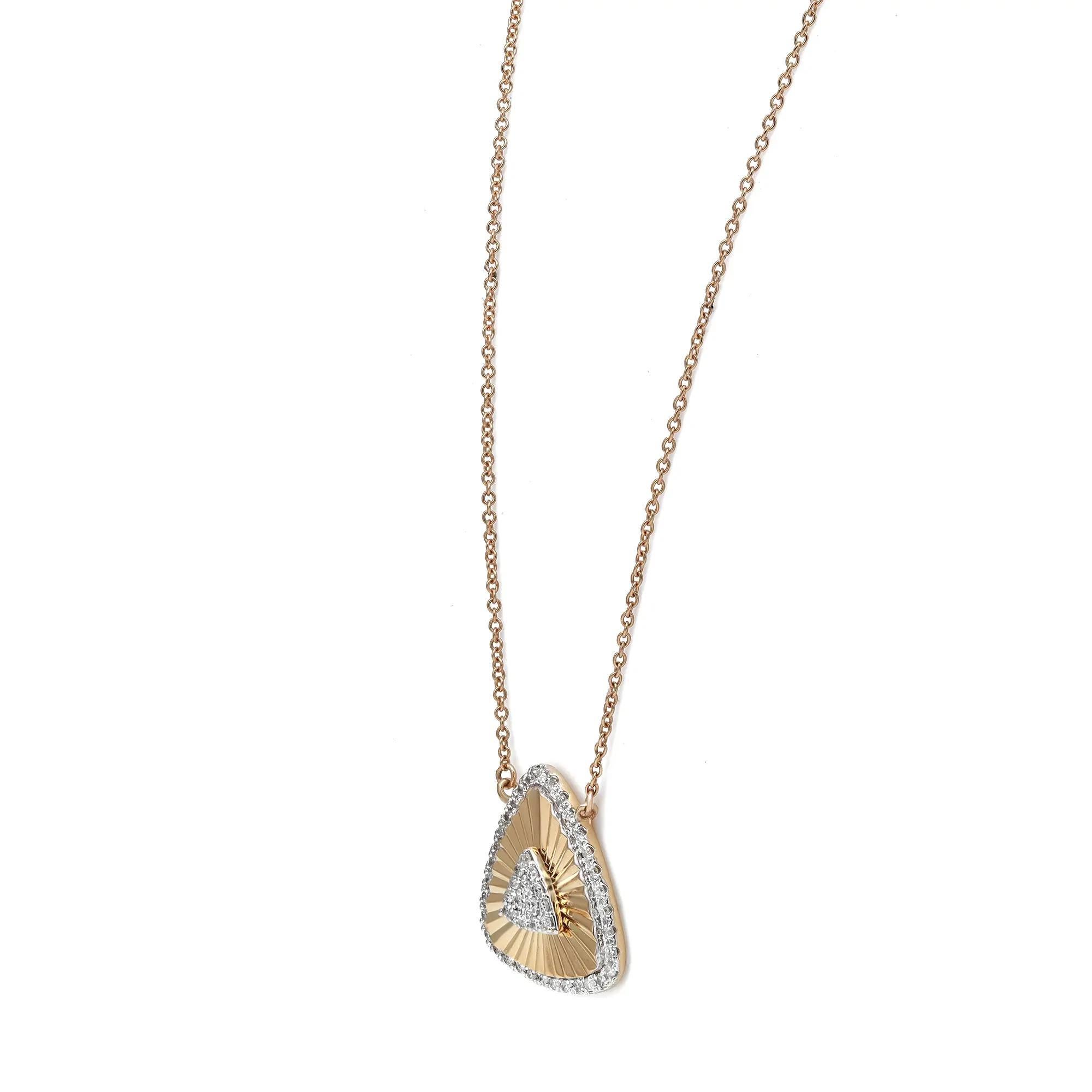 Elevate any outfit with this beautiful triangular diamond pendant necklace. Crafted in 14K yellow gold. This pendant features engraved pave set round cut diamonds studded in a triangular pendant with cuban link adjustable chain. Secured with a
