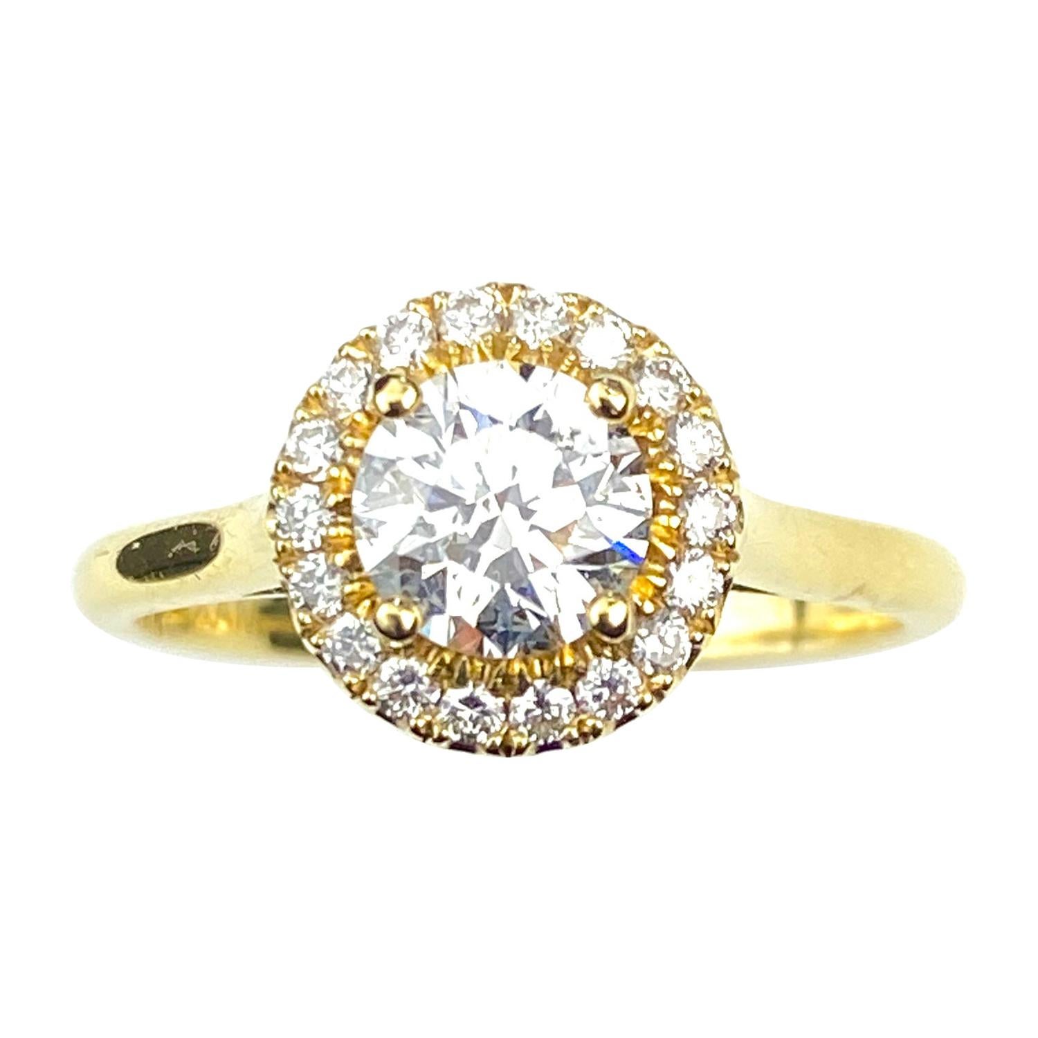 Round Cut Diamond Yellow Gold Engagement Ring with Halo and Basket Setting For Sale