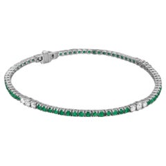 Bracciale tennis con smeraldo taglio rotondo 2,60 carati e diamante 0,47 carati in oro bianco 14 carati 7 pollici