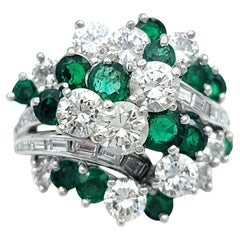 Round Cut Emerald and Diamond Domed Cluster Cocktail Ring in Polished Platinum