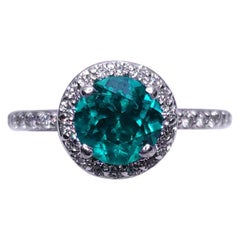 Round Cut Emerald and Diamond Ring in Platinum, 1.00ctw