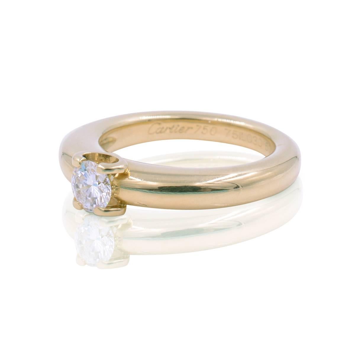 You are Purchasing Cartier 0.30 ct 18K Yellow Gold Round Brilliant Cut Diamond Solitaire Prong Set Engagement Ring. The ring weighs 7.8 grams and is 5.5 however fits a 6 as well (French Size 50). The center stone is a Round Brilliant Cut diamonds