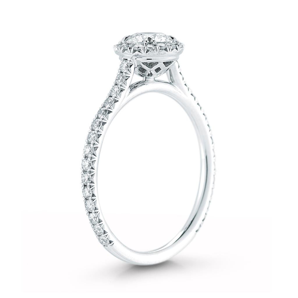 Beautiful diamond engagement ring crafted in Platinum set with half a carat round brilliant cut diamond. Lovely ring that won't break the bank. We guarantee craftsmanship and quality execution since every ring is made in house. Durable and luxurious
