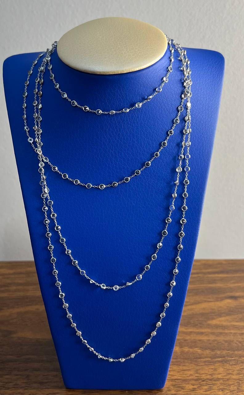 Discover the elegance of this exquisite necklace.

Crafted with precision, this piece features 64.0 carats of shimmering brilliance of blue topaz, each stone meticulously set to enhance its natural beauty.

The necklace is fashioned from 14k white