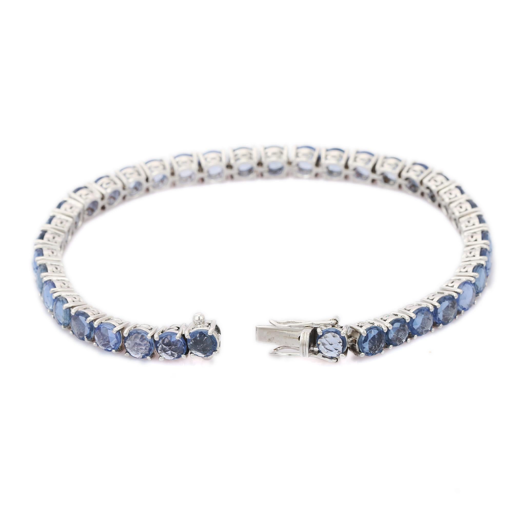 Blue Sapphire bracelet in 18K Gold. It has a perfect round cut gemstone to make you stand out on any occasion or an event.
A tennis bracelet is an essential piece of jewelry when it comes to your wedding day. The sleek and elegant style complements