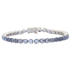 Pulsera de tenis de zafiro azul natural talla redonda en oro blanco macizo de 18 quilates