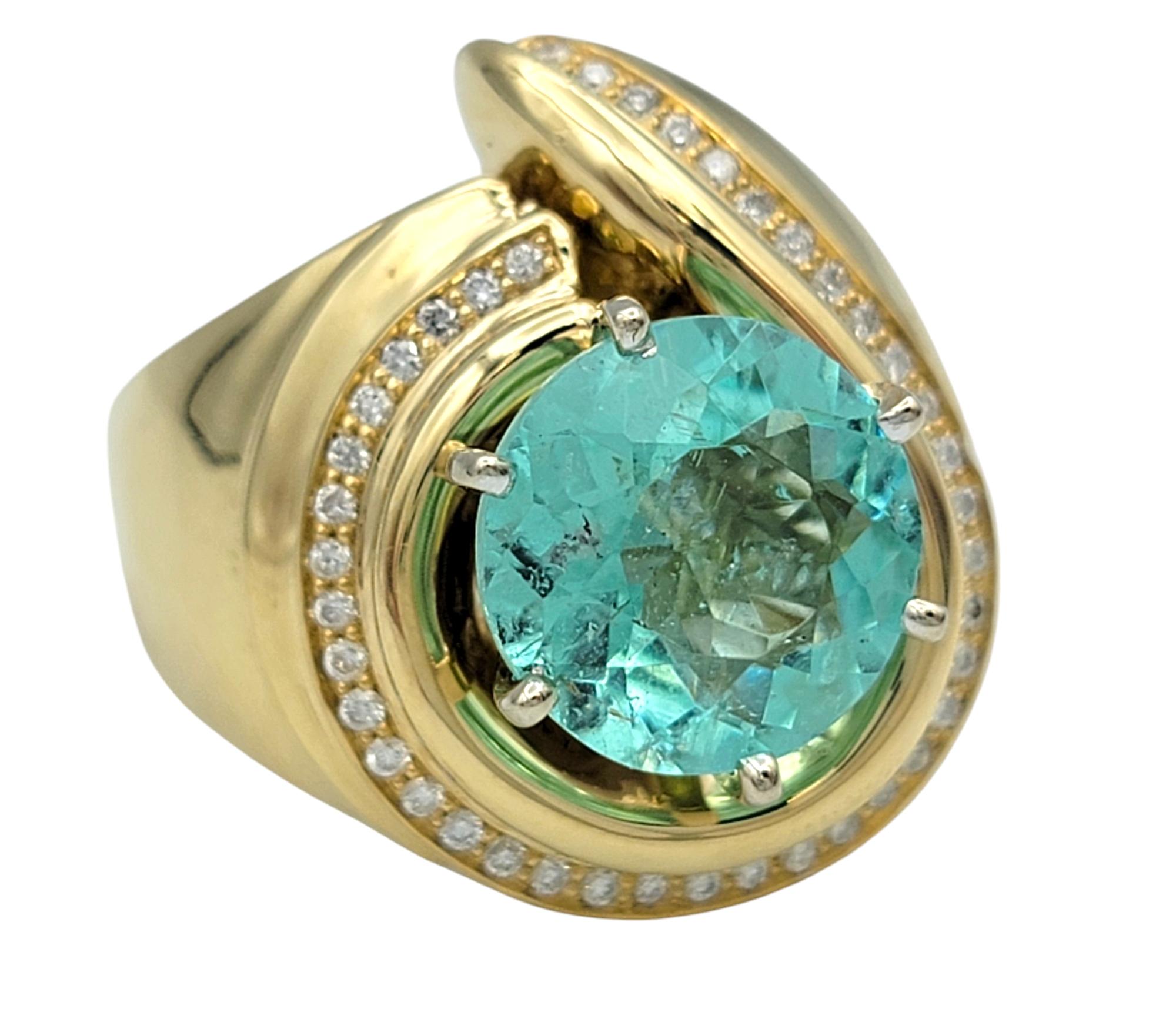 Contemporary Round Cut Paraiba Tourmaline and Diamond Domed Swirl Ring 14 Karat Yellow Gold For Sale