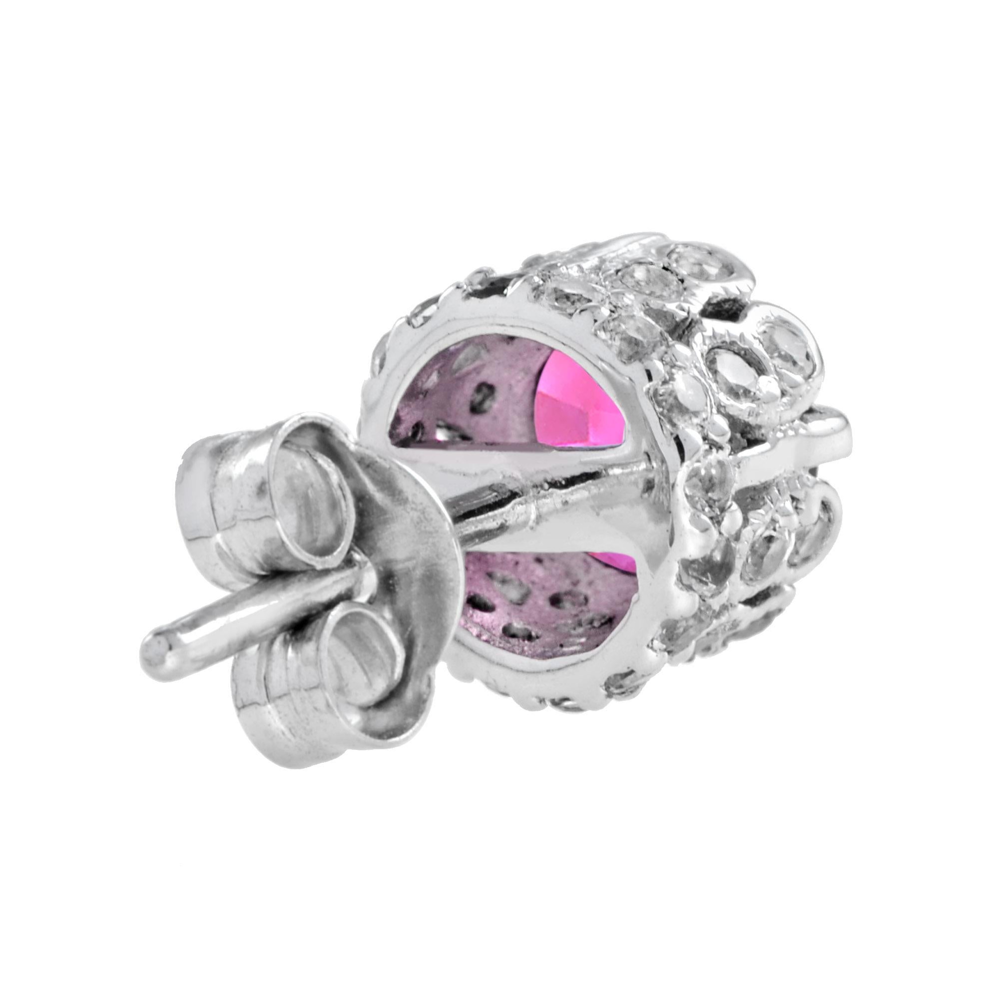 Simple, yet elegant, these earrings have a ruby center stone with an enhanced design to add to the sparkle. Perfect for those casual occasions where you want to add a little bling. Or perfect to add an understated sparkle for a more formal