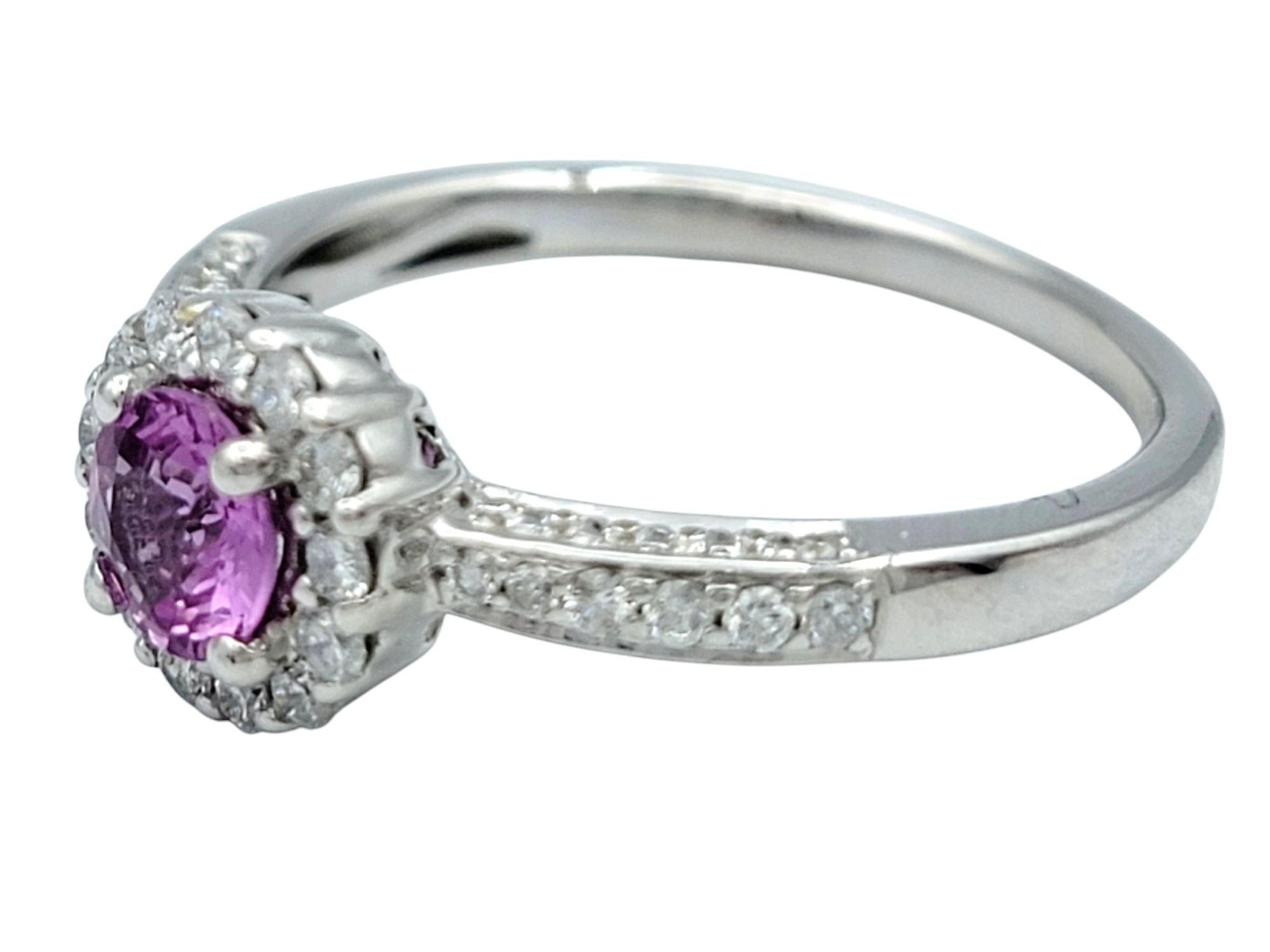 Round Cut Pink Sapphire and Pavé Diamond Halo Ring in 14 Karat White Gold For Sale 1