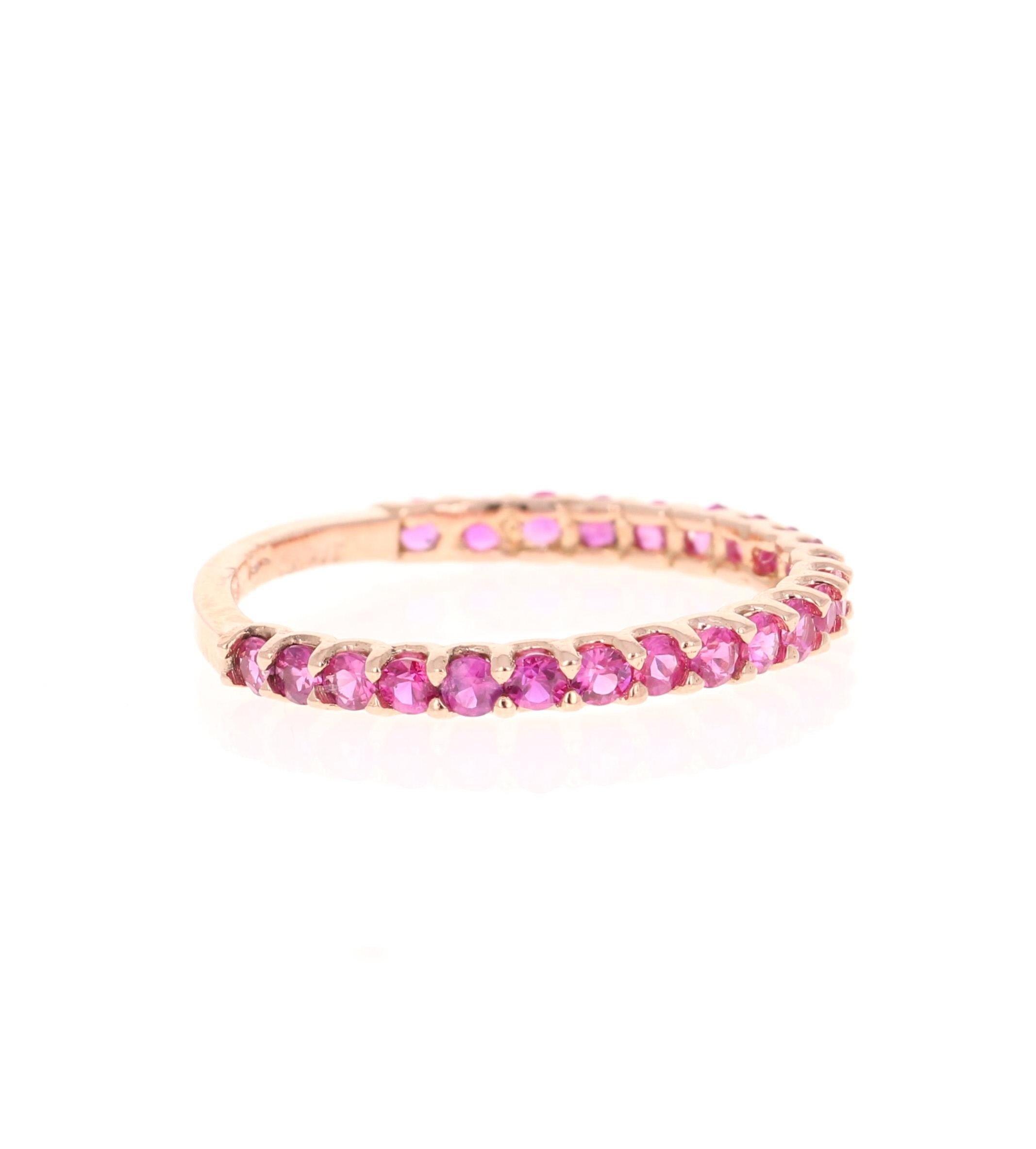 This ring has 23 Natural Round Cut Dark Pink Sapphires that weigh 0.87 Carats. 

Crafted in 14 Karat Rose Gold and weighs approximately 1.3 grams 

The ring is a size 7 and can be re-sized at no additional charge!

We have this same ring available